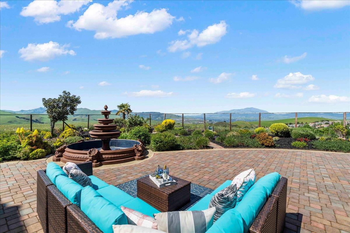 953 Winsford Court San Ramon, CA 94583 - Photo 3 of 73 a view of a patio with couches table and chairs with potted plants