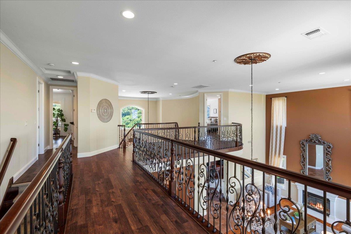 953 Winsford Court San Ramon, CA 94583 - Photo 35 of 73 a view of a hallway with furniture and wooden floor