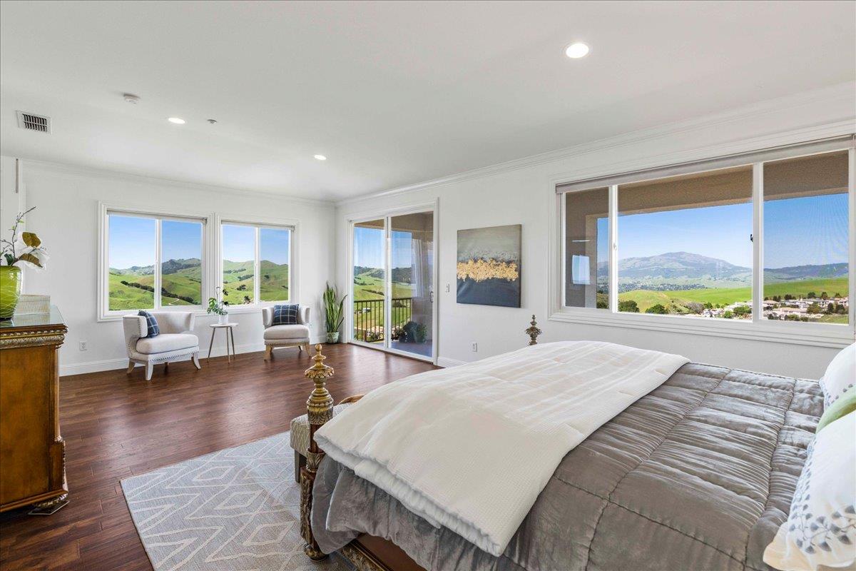 953 Winsford Court San Ramon, CA 94583 - Photo 40 of 73 a large bedroom with a large window and furniture