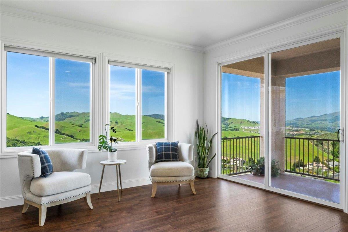 953 Winsford Court San Ramon, CA 94583 - Photo 41 of 73 a living room with furniture and a large window with garden view