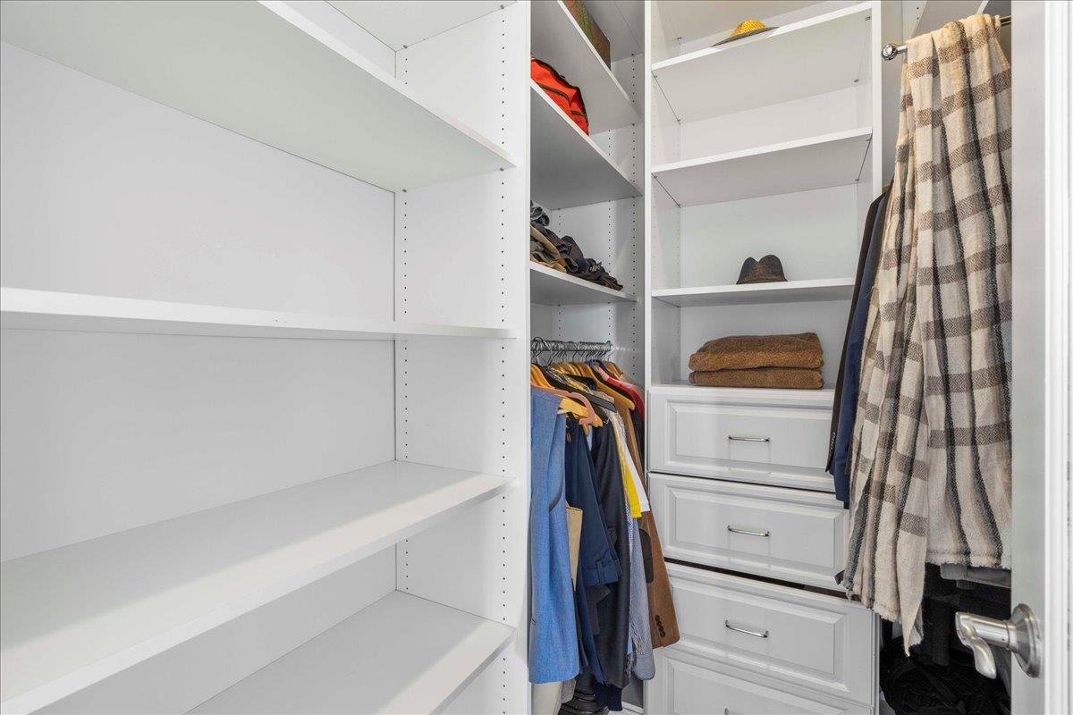 953 Winsford Court San Ramon, CA 94583 - Photo 46 of 73 a view of walk in closet with clothes and shoes