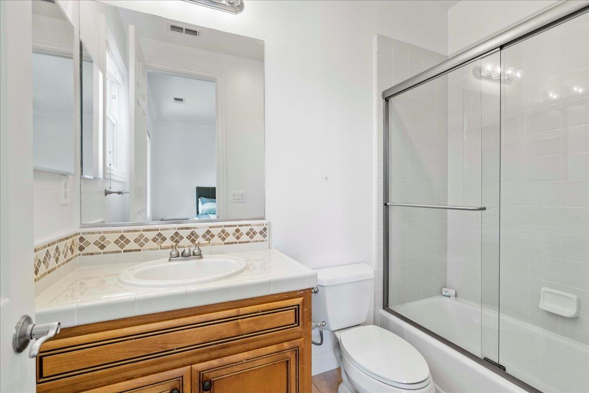 953 Winsford Court San Ramon, CA 94583 - Photo 53 of 73 a bathroom with a sink a toilet and shower