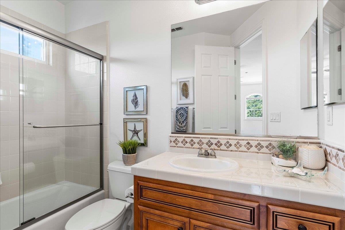 953 Winsford Court San Ramon, CA 94583 - Photo 55 of 73 a bathroom with a sink a toilet and shower