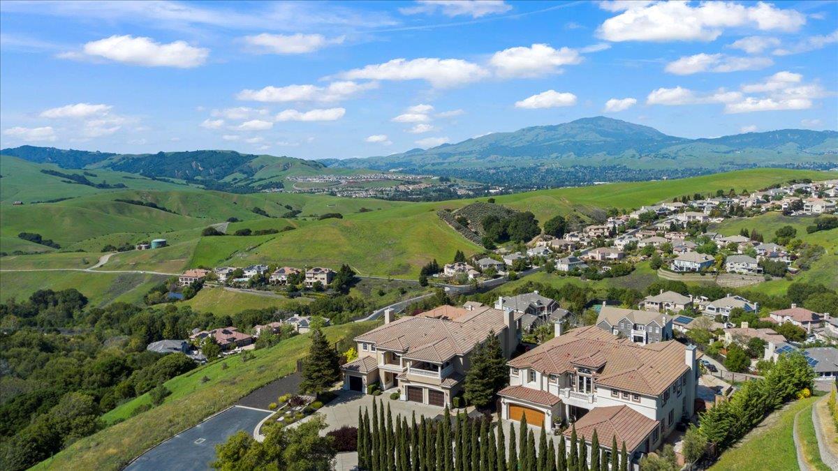 953 Winsford Court San Ramon, CA 94583 - Photo 7 of 73 an aerial view of a city with lots of residential buildings and mountain view in back
