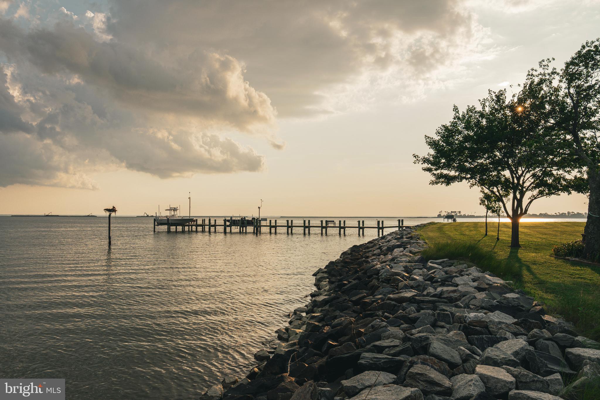 2554 Hoopers Island Road Fishing Creek, MD 21634 - Photo 15 of 85 a view of ocean with boats and trees in all around