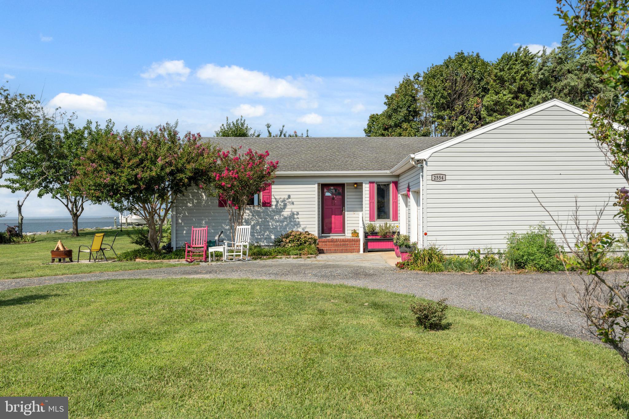 2554 Hoopers Island Road Fishing Creek, MD 21634 - Photo 17 of 85 a view of a house with outdoor space and yard