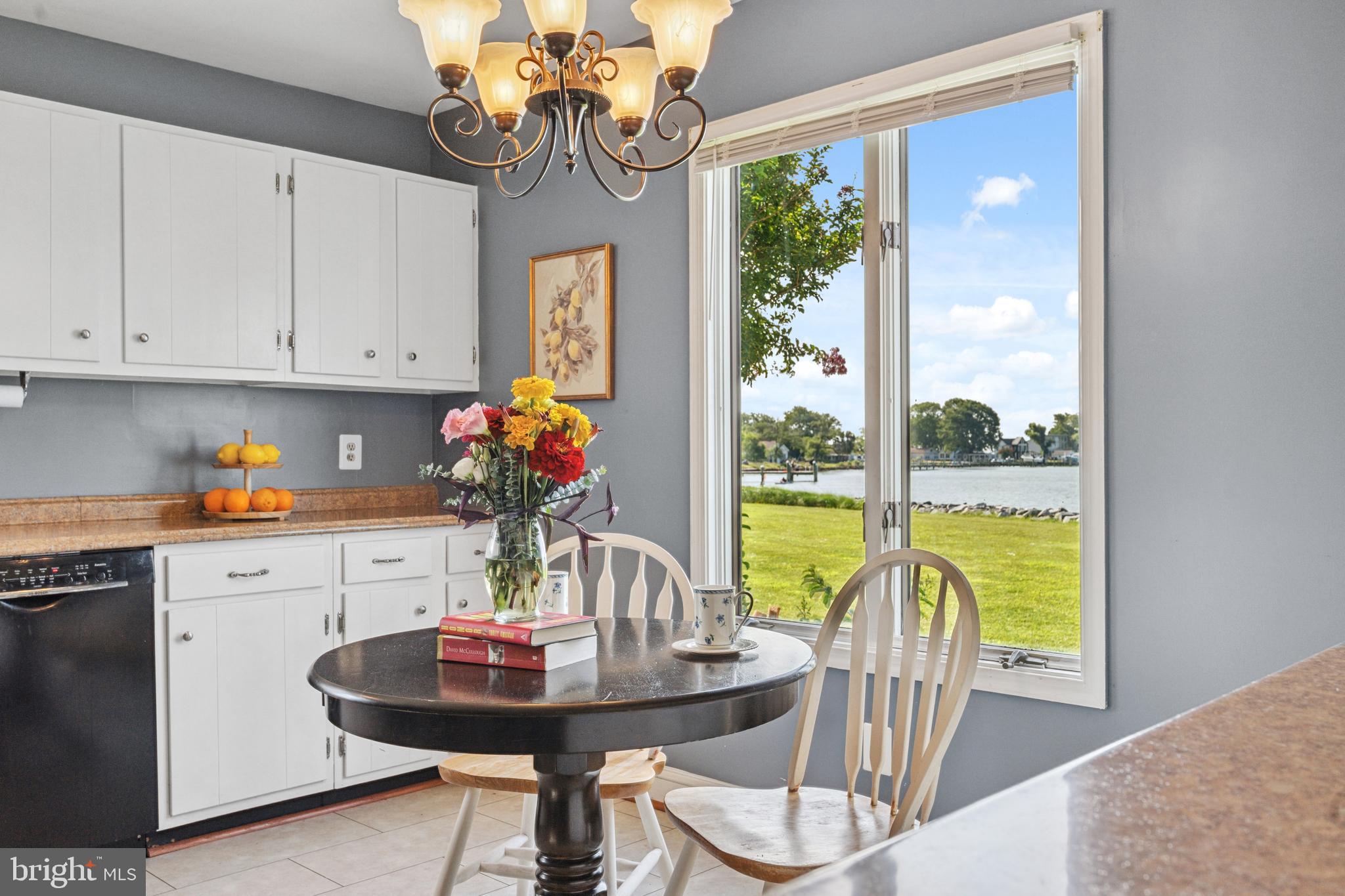2554 Hoopers Island Road Fishing Creek, MD 21634 - Photo 27 of 85 a view of a dining room with furniture window and outside view