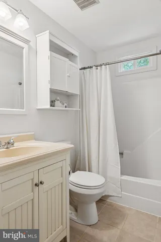 a large body of water with a large trees