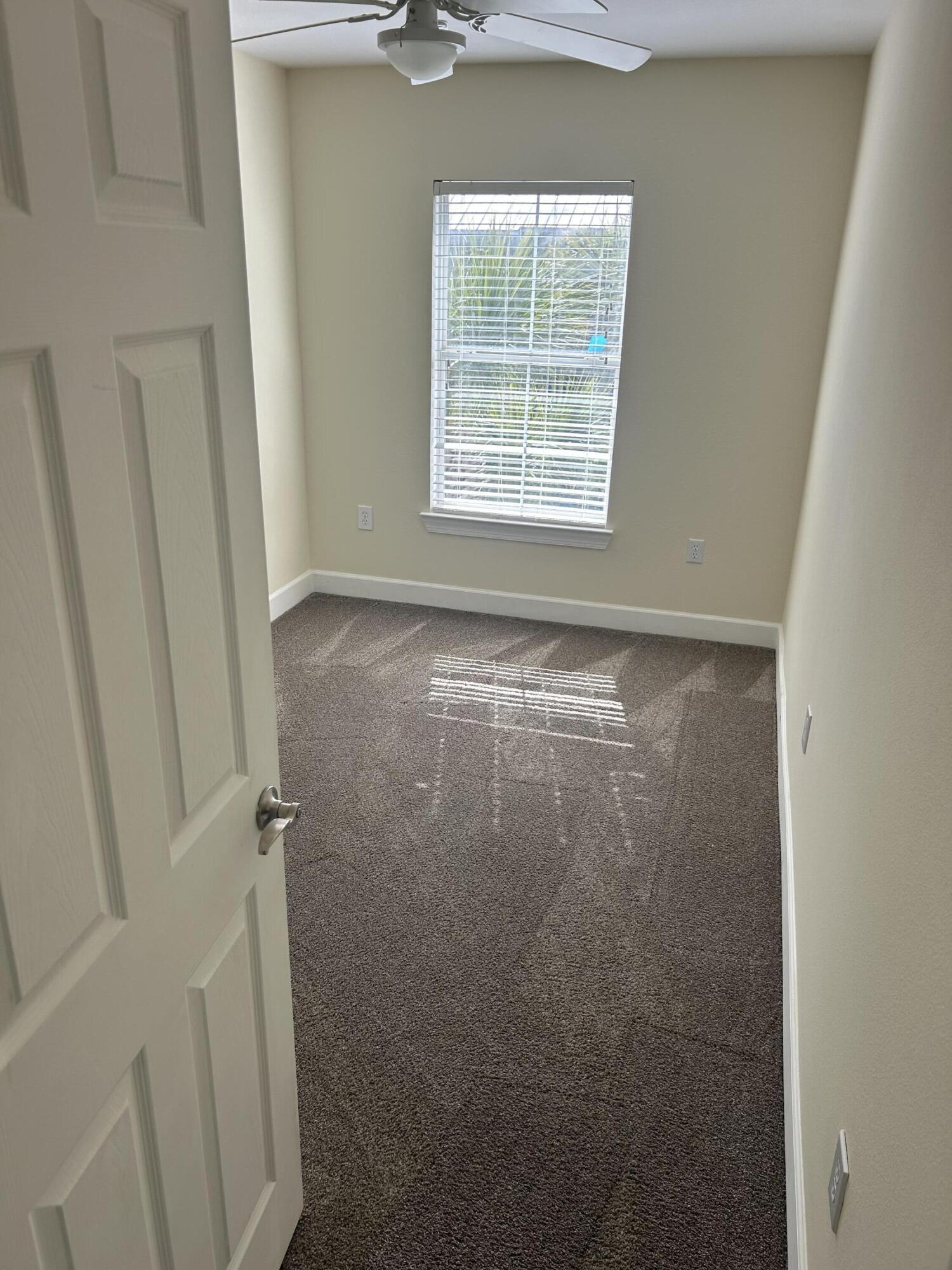 17 Bald Eagle Court, Unit 6G Santa Rosa Beach, FL 32459 - Photo 11 of 12 a view of an empty room with a window