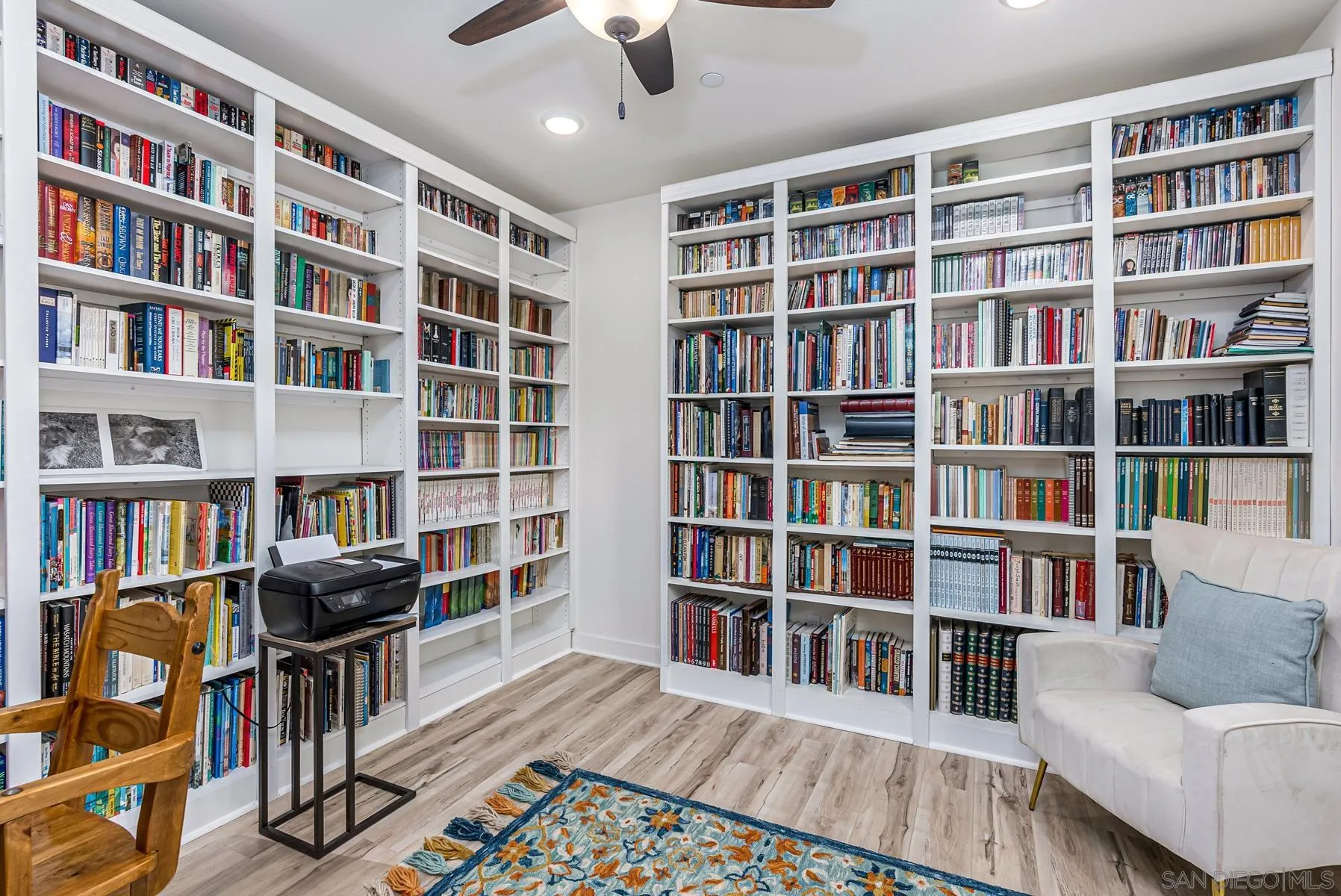 8855 Weston Road Santee, CA 92071 - Photo 15 of 36 a view of a livingroom with furniture and book shelf