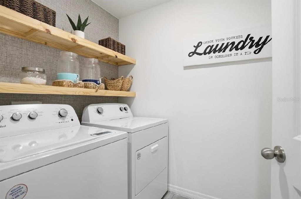 6761 Southeast 3rd Loop Ocala, FL 34472 - Photo 21 of 32 a utility room with dryer and washer