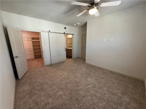 a view of a hallway with window