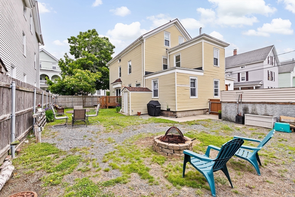 93 Warren Street Fall River, MA 02721 - Photo 32 of 42 a view of a house with backyard and sitting area