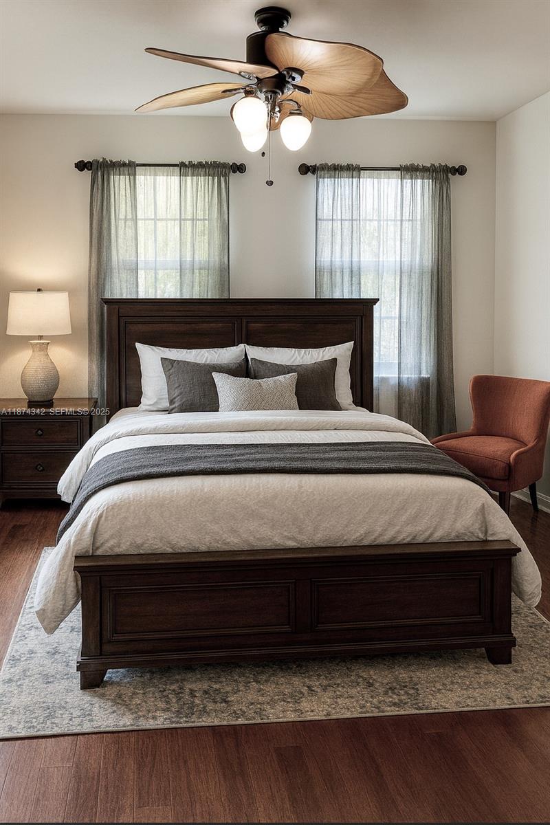 6312 West Sample Road, Unit 6312 Coral Springs, FL 33067 - Photo 12 of 21 a bedroom with a bed and window