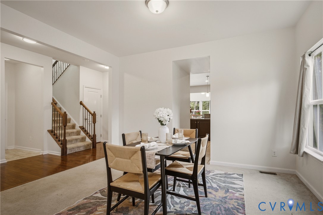 9013 Bailey Hill Road Midlothian, VA 23112 - Photo 12 of 56 Dining area featuring a central ceiling light fixt