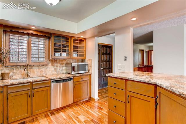 4672 Ranch Drive Colorado Springs, CO 80918 - Photo 8 of 27 Another view from the kitchen.