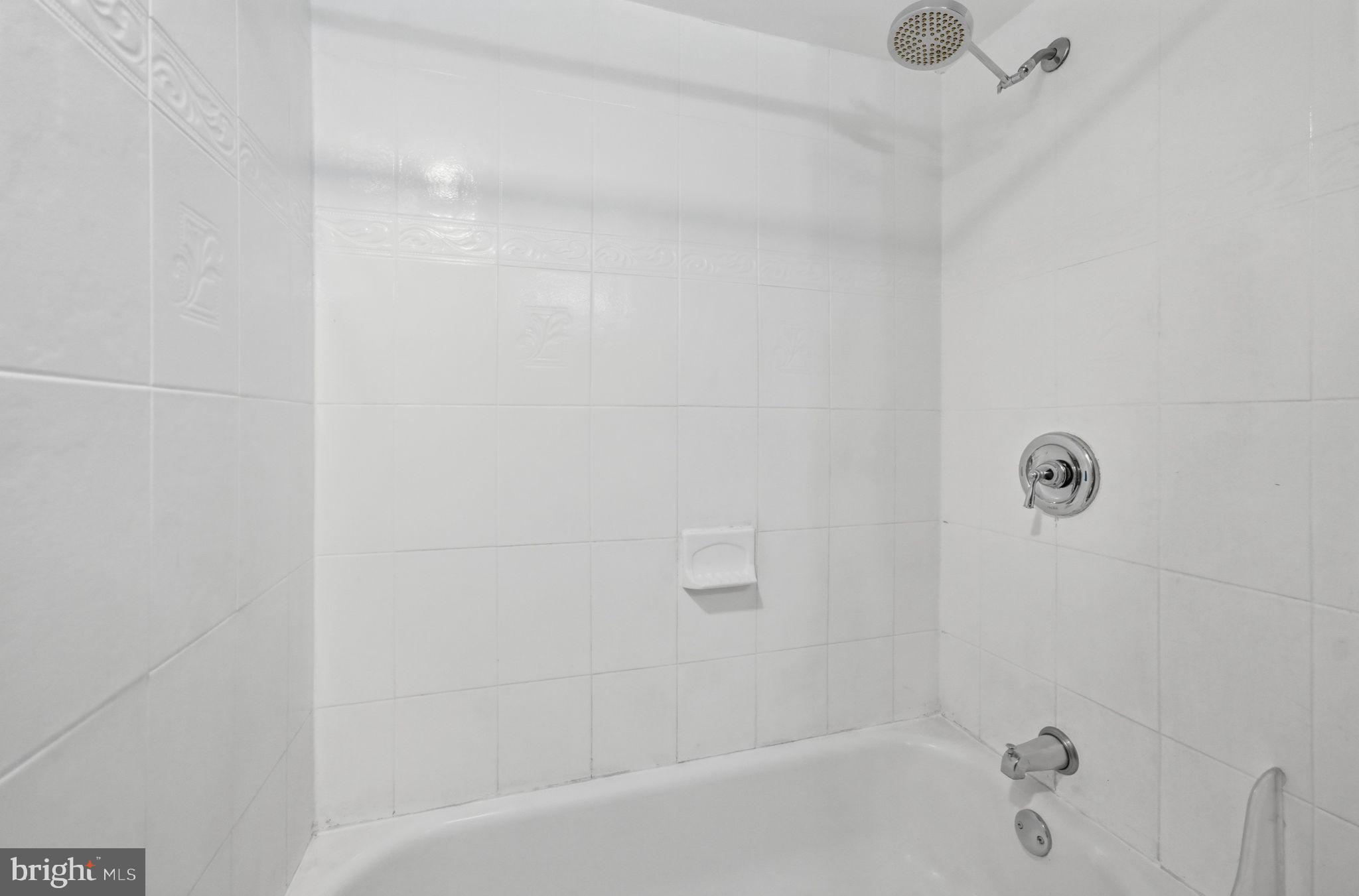 2901 Charing Cross Road, Unit 11 Falls Church, VA 22042 - Photo 18 of 34 Shower and tub in bathroom