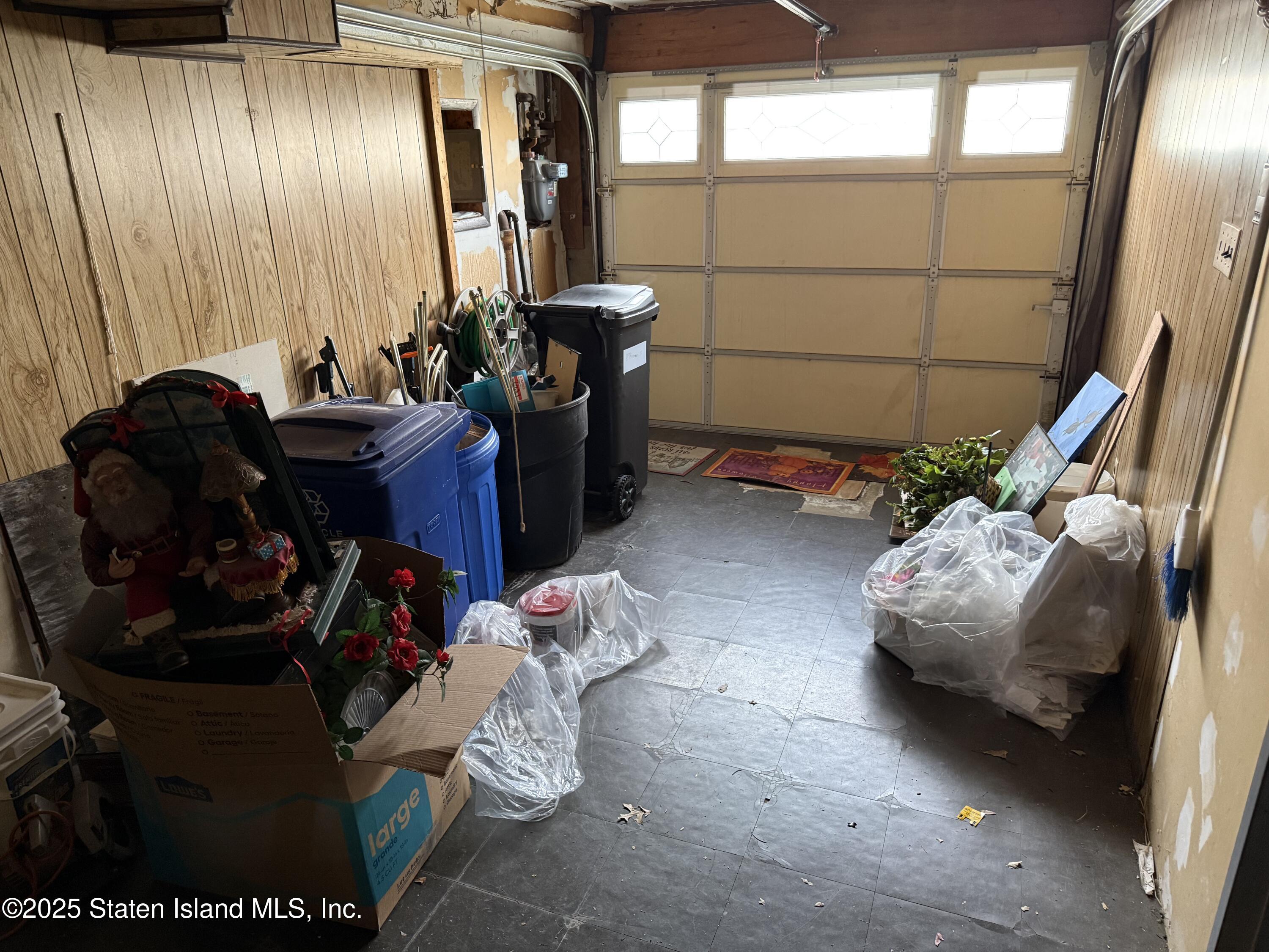 89 Kenmore Street Staten Island, NY 10312 - Photo 18 of 18 a living room with furniture and a window