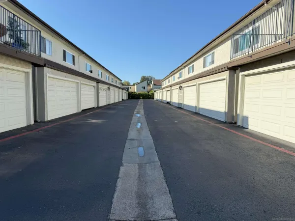 a view of a house with a street