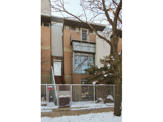 a view of a house with a tree