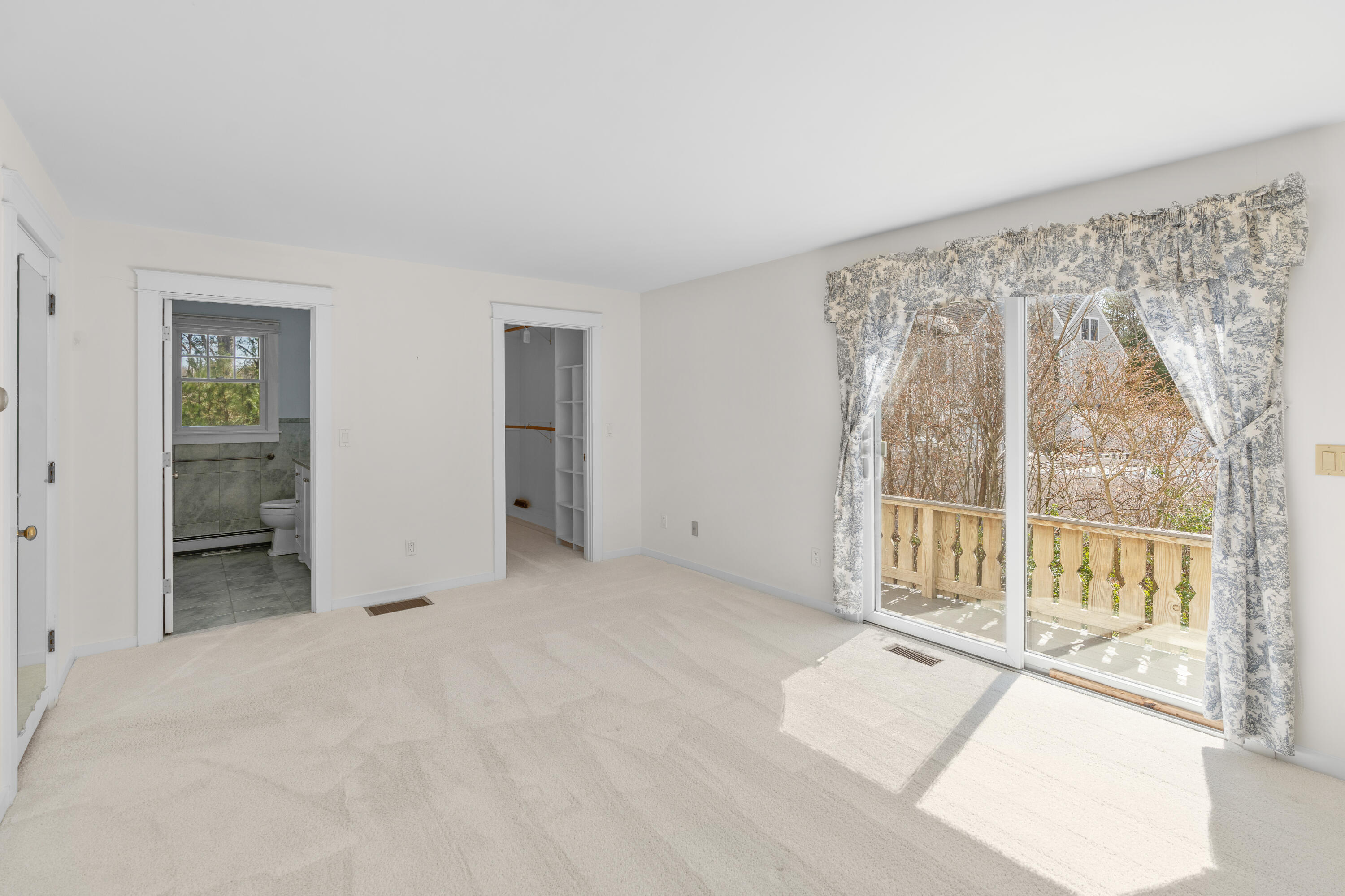 51 Walton Heath Way Mashpee, MA 02649 - Photo 13 of 35 wooden floor in an empty room with a window