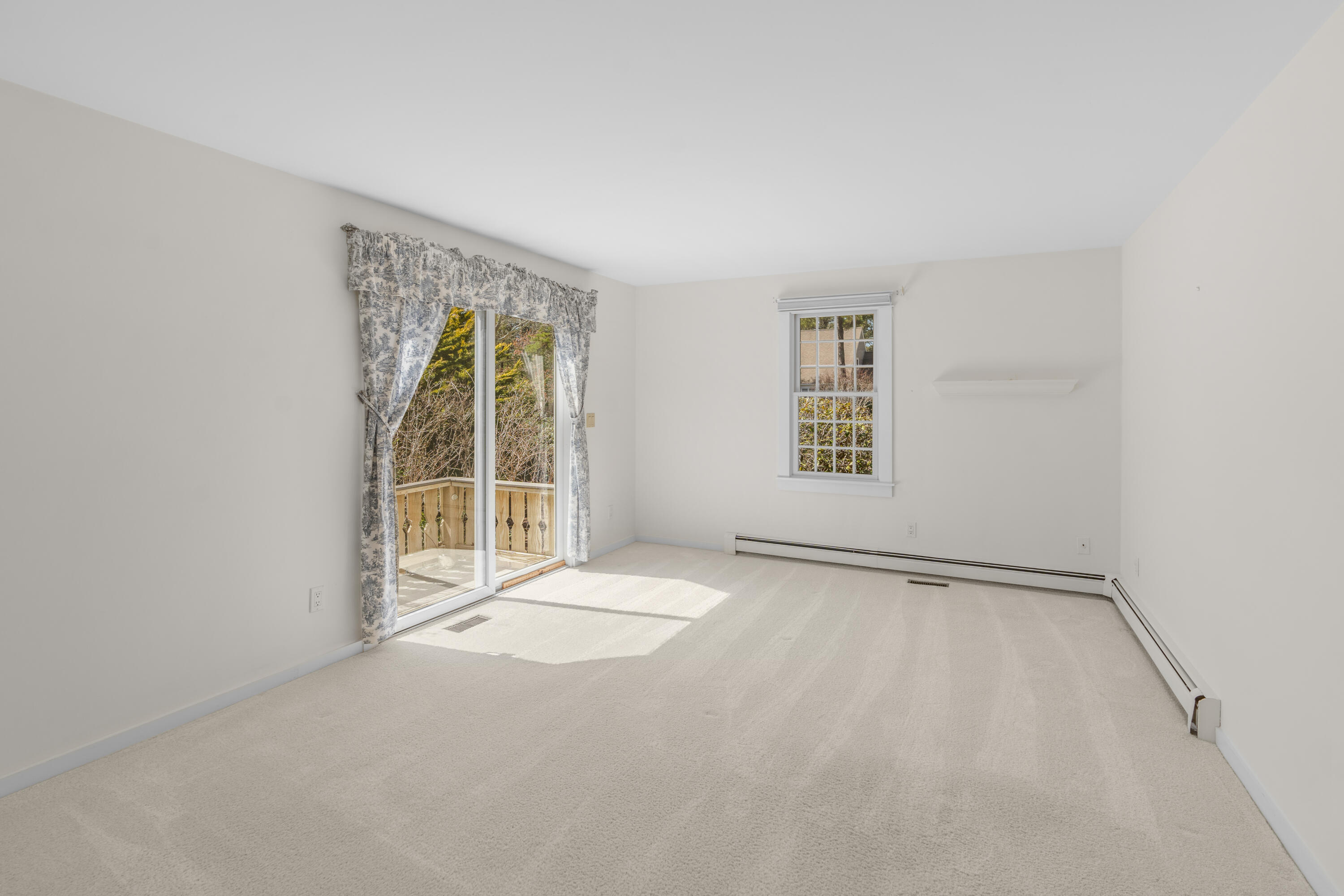 51 Walton Heath Way Mashpee, MA 02649 - Photo 14 of 35 a view of an empty room with a window