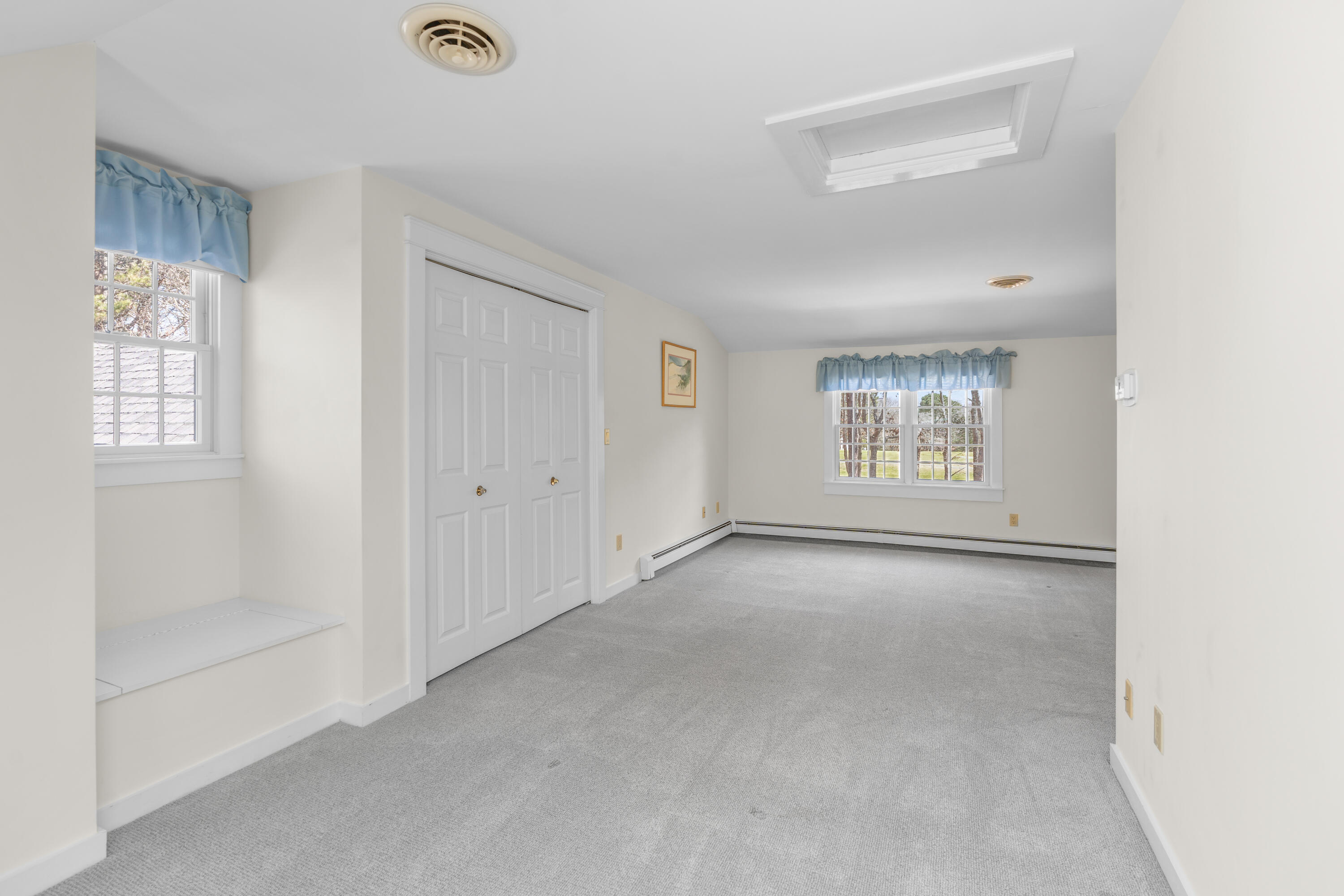 51 Walton Heath Way Mashpee, MA 02649 - Photo 17 of 35 a view of an empty room with a window