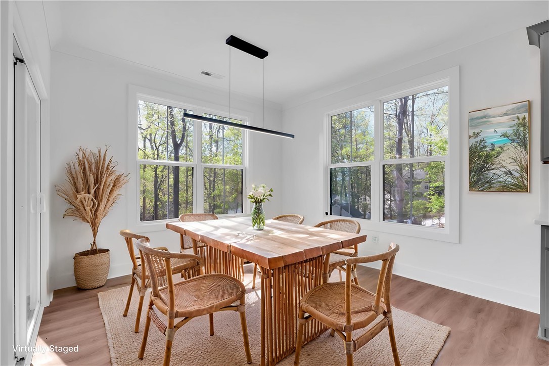 407 Blue Ridge Court Westminster, SC 29693 - Photo 16 of 48 This bright dining area offers abundant natural light and a seamless connection to the outdoors.