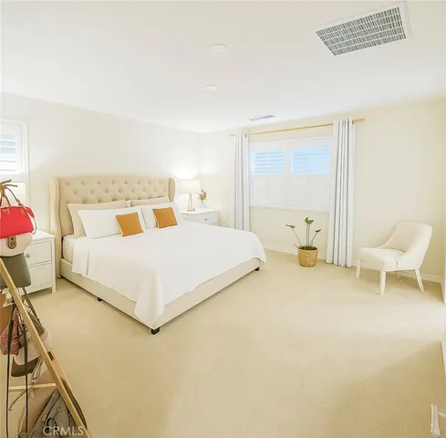 a bathroom with a double vanity sink and mirror