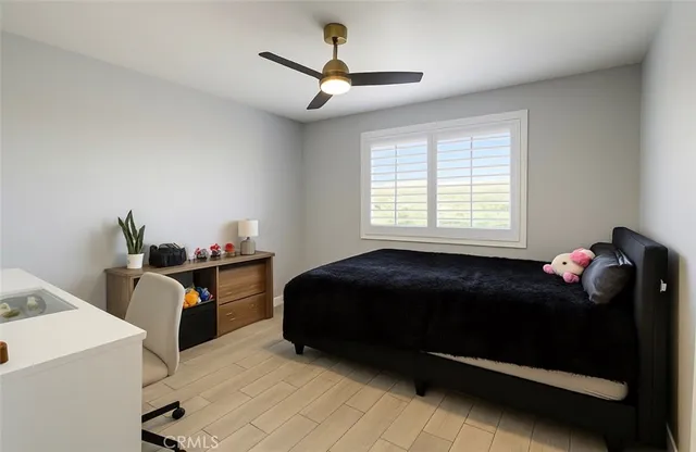 a bathroom with a double vanity sink and mirror