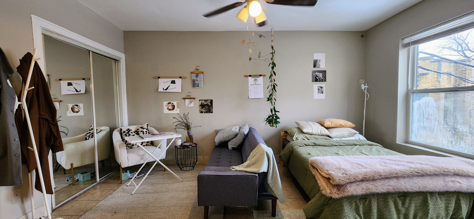 4764 North Virginia Avenue, Unit 214 Chicago, IL 60625 - Photo 9 of 12 a bedroom with a bed and a window