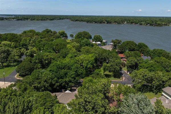 an aerial view of a residential houses and lake view