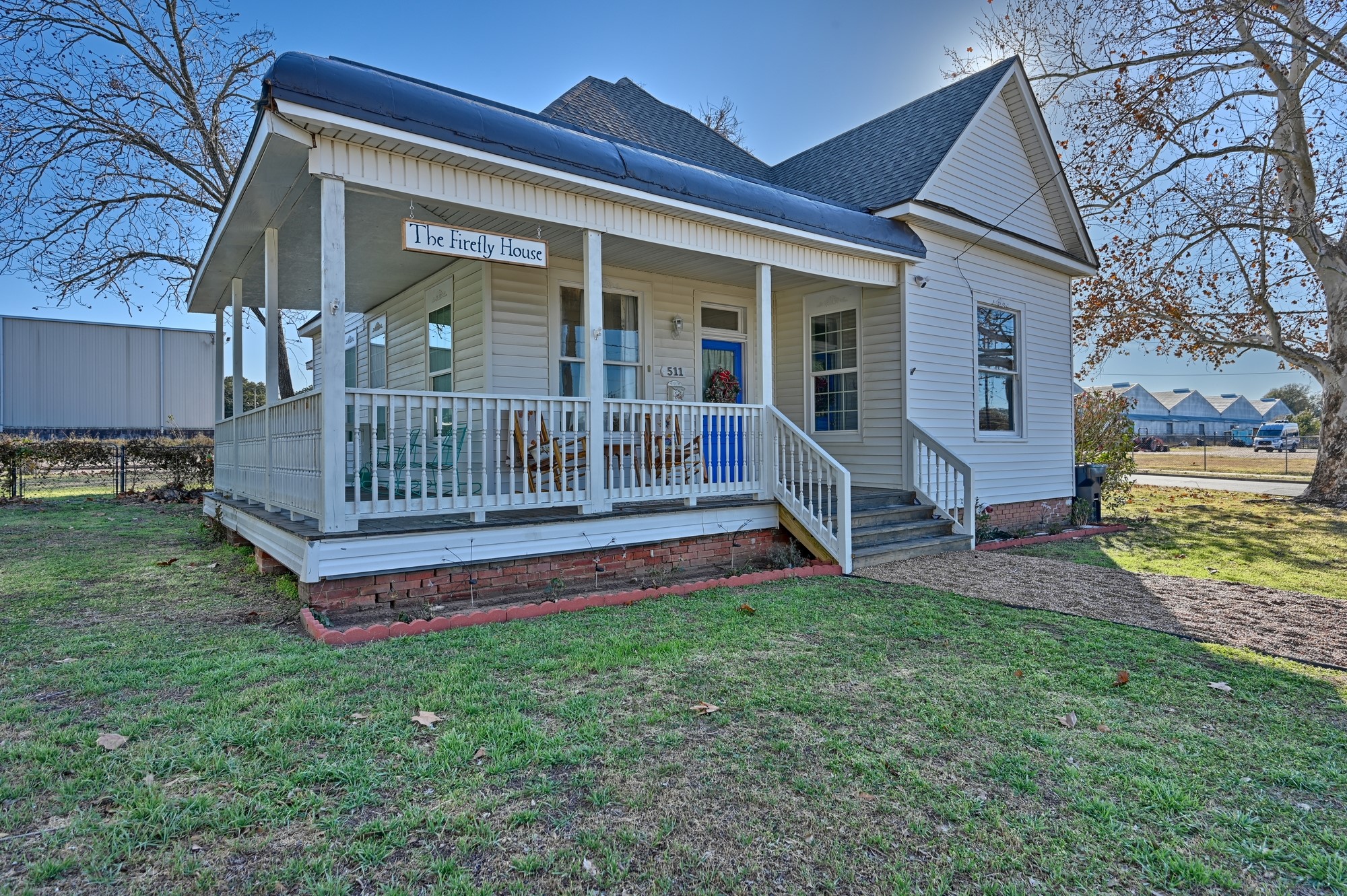 511 Peabody Street Brenham, TX 77833 - Photo 2 of 25 a view of a house with a yard and deck