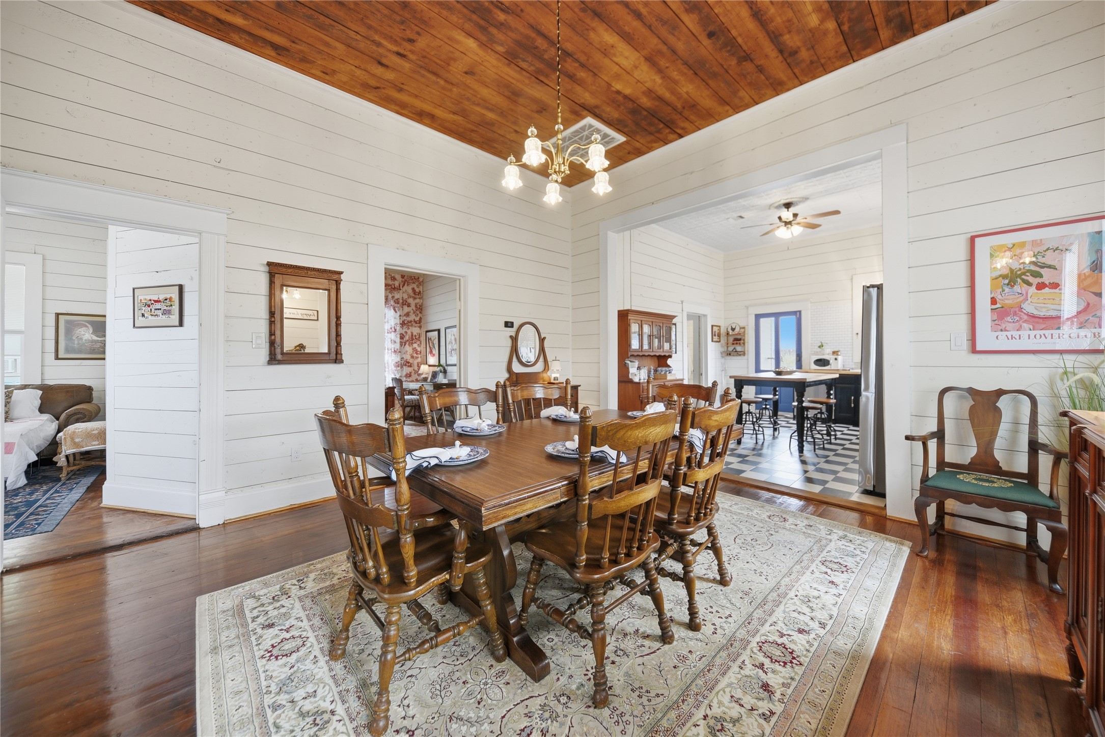 511 Peabody Street Brenham, TX 77833 - Photo 6 of 25 a view of a dining room with furniture and wooden floor