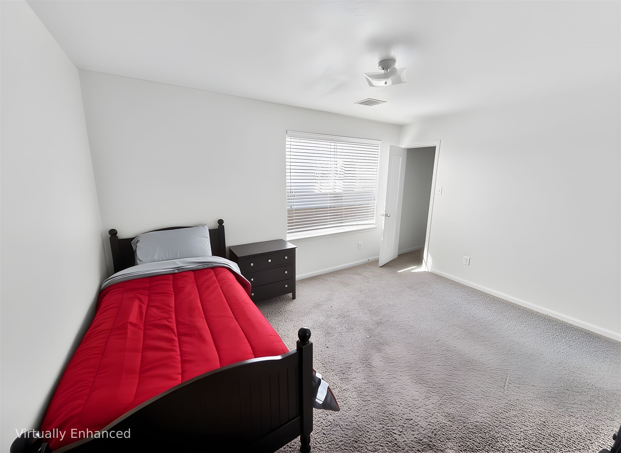 5127 Oak Briar Lane Rosenberg, TX 77469 - Photo 17 of 21 Two of 4 upstairs bedrooms. Some of the furniture has been digitally removed from the photo.