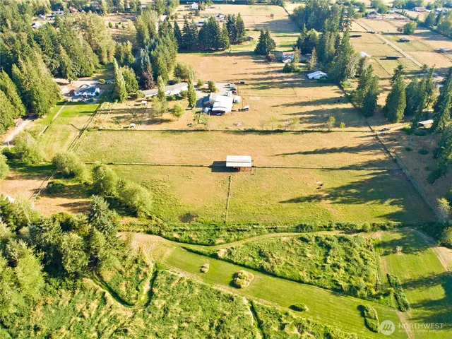 a view of an ocean and a house