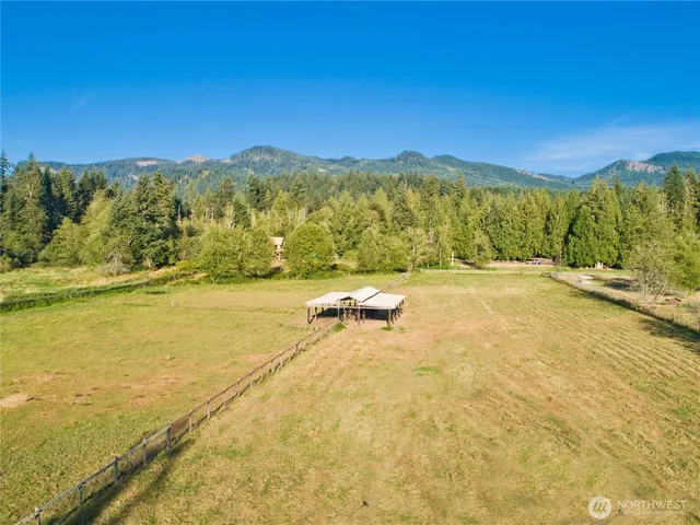 a view of a ocean with a mountain view