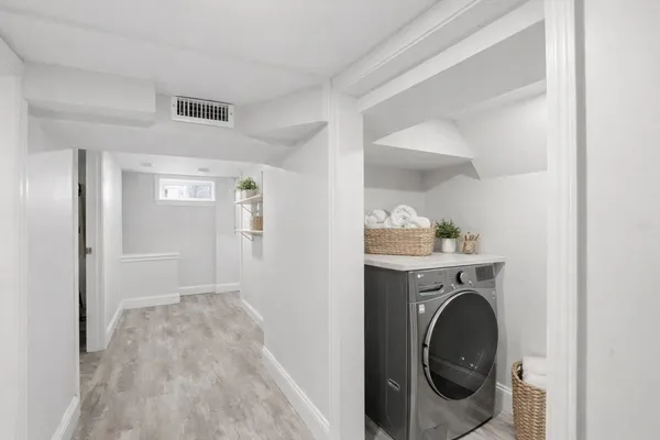 a view of a storage & utility room with washer and dryer