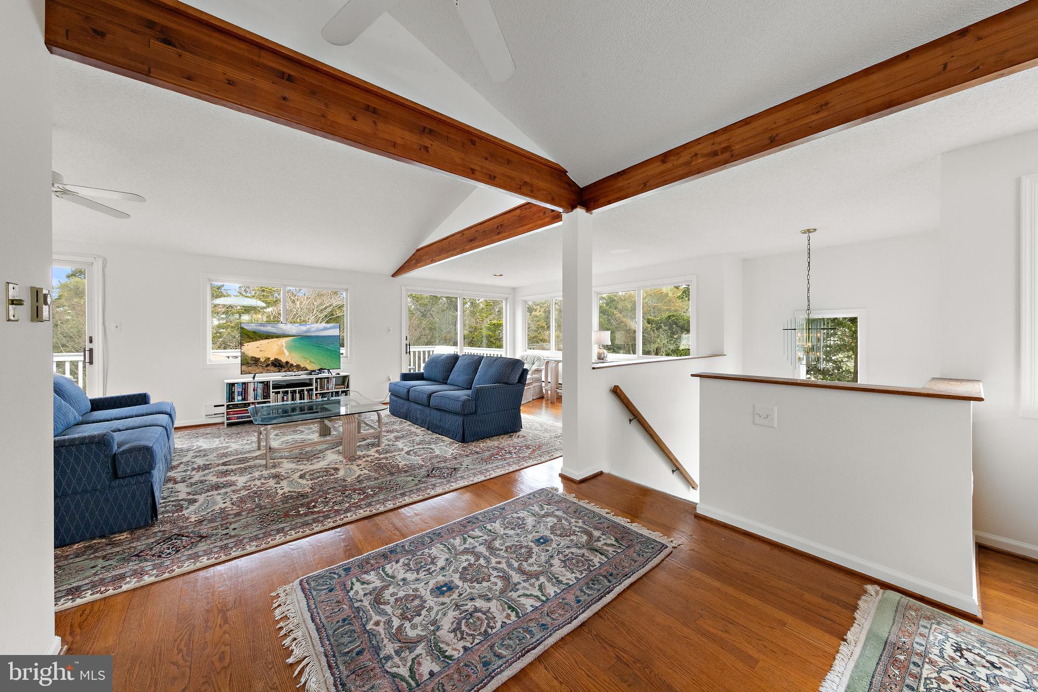 20 East 8th Street Barnegat Light, NJ 08006 - Photo 34 of 80 a living room with furniture and a rug