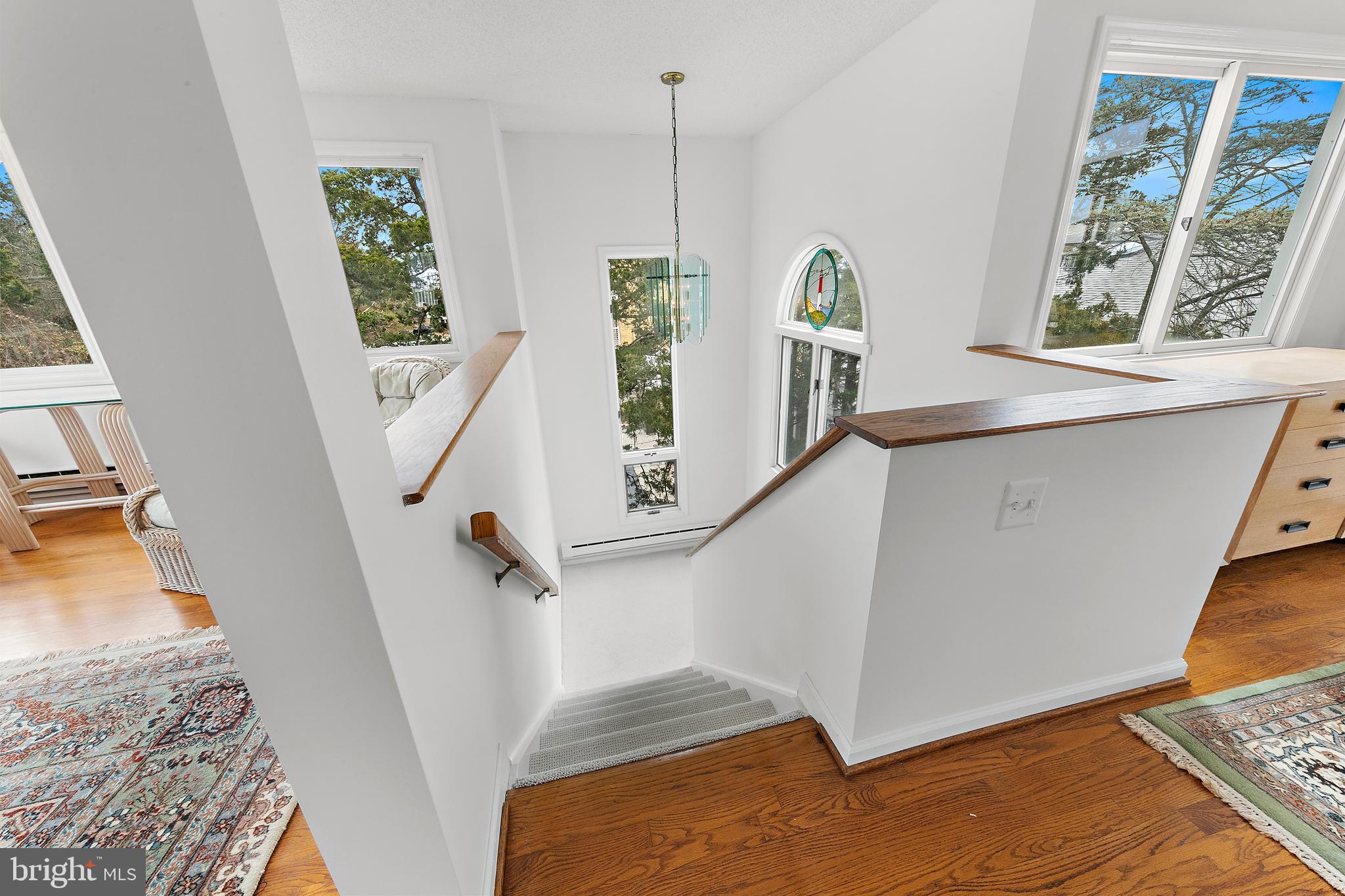 20 East 8th Street Barnegat Light, NJ 08006 - Photo 35 of 80 a view of entryway and hall with wooden floor