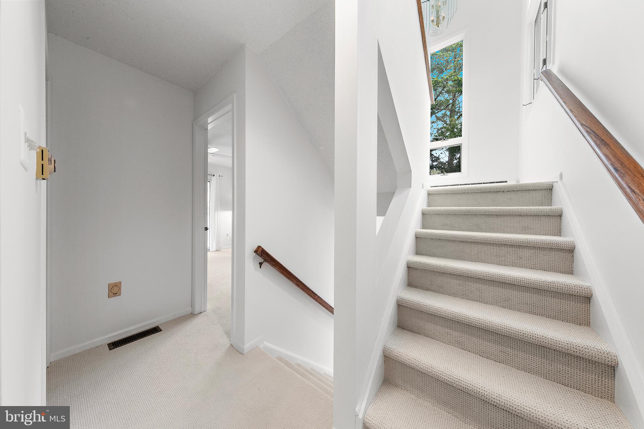 20 East 8th Street Barnegat Light, NJ 08006 - Photo 36 of 80 a view of staircase with white walls and a window