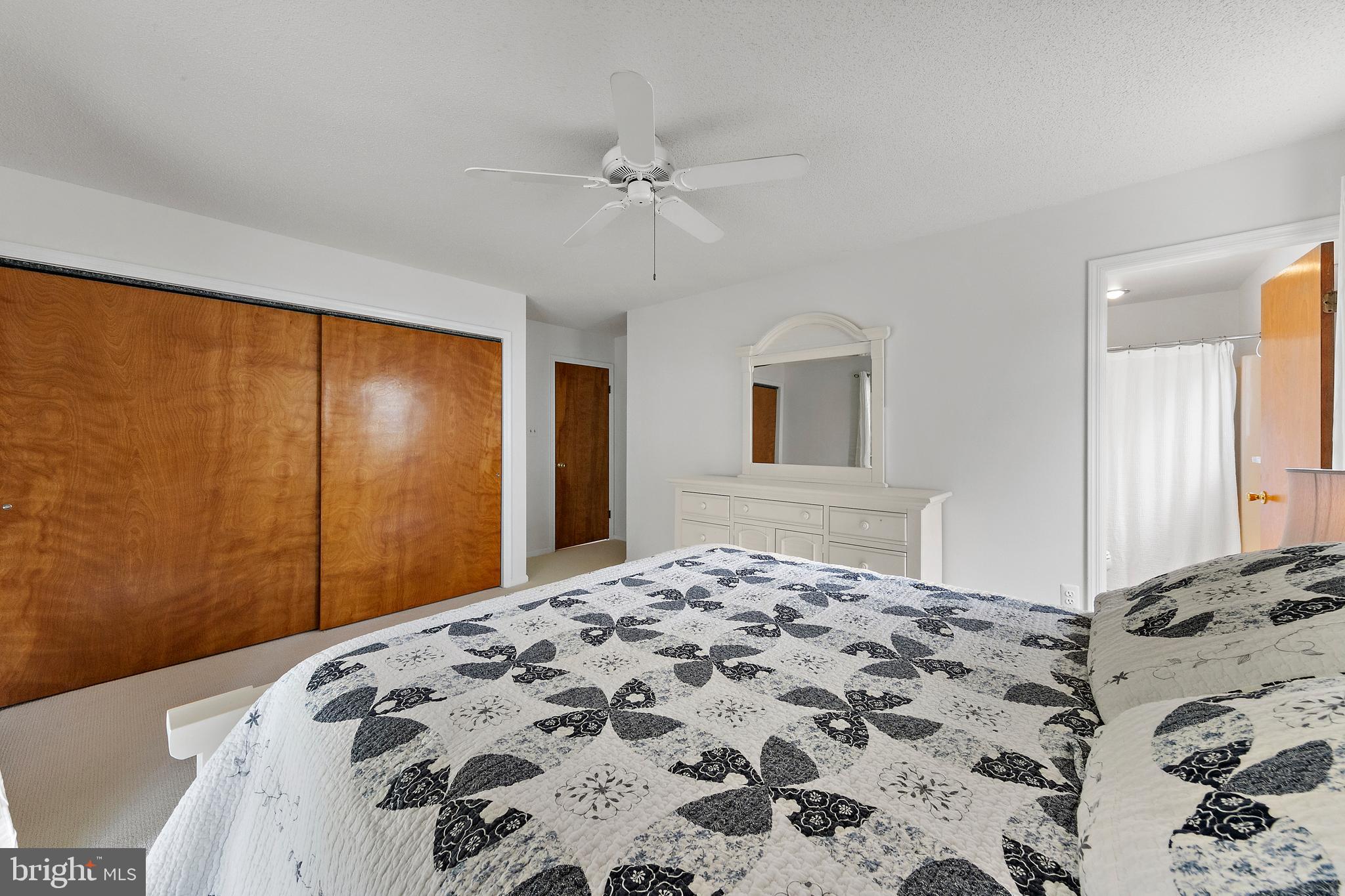 20 East 8th Street Barnegat Light, NJ 08006 - Photo 38 of 80 a bedroom with a bed and a dresser