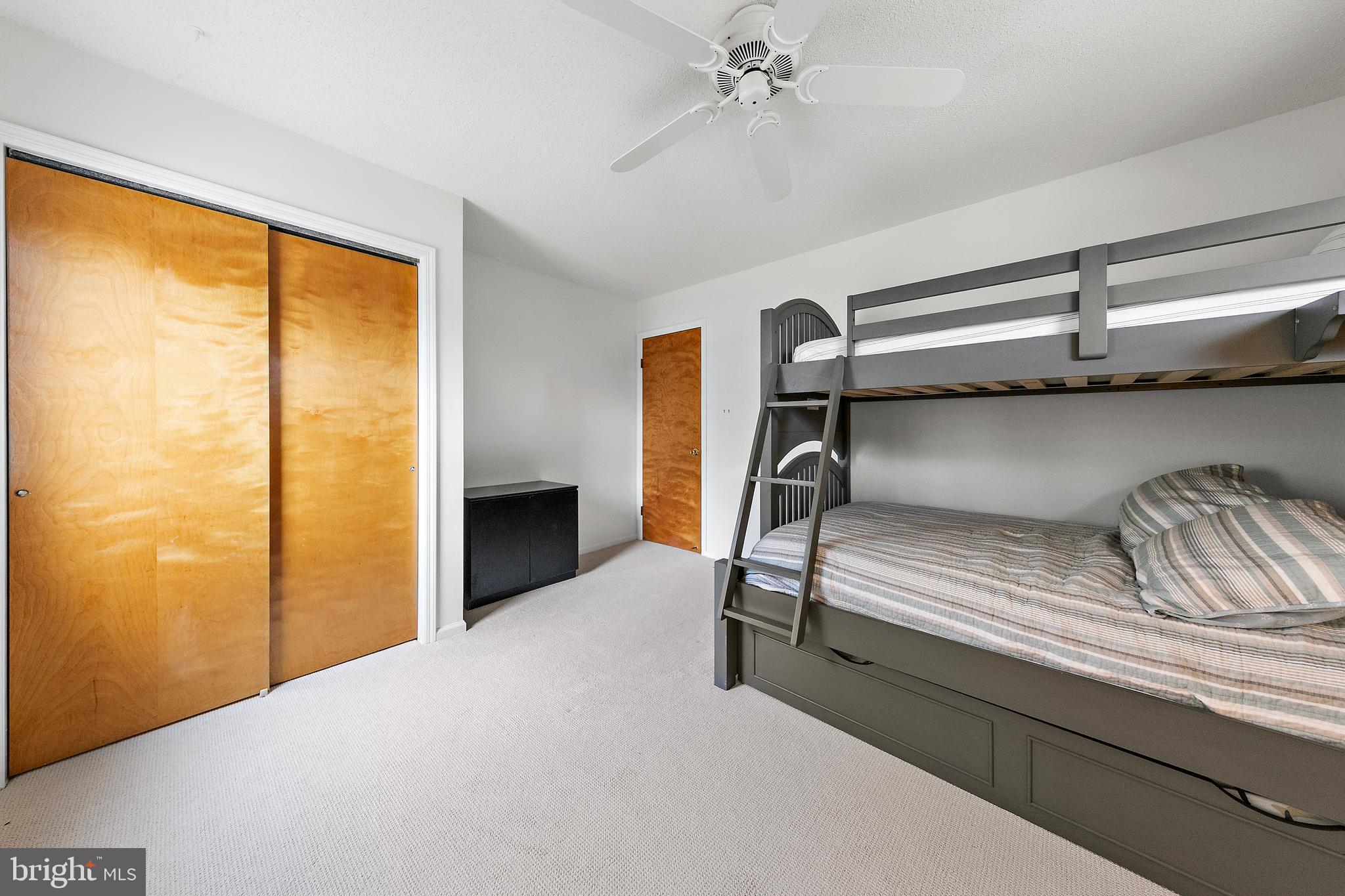 20 East 8th Street Barnegat Light, NJ 08006 - Photo 41 of 80 a bedroom with a bed and a window