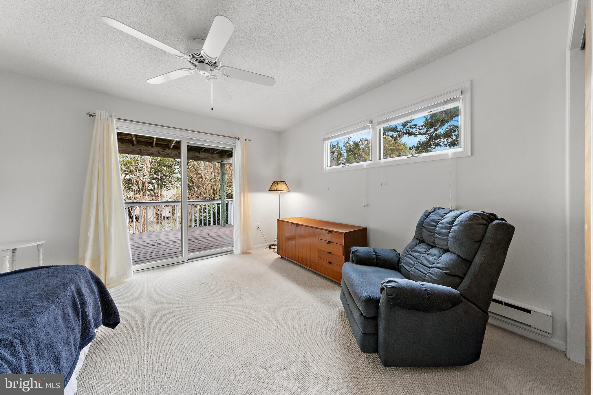 20 East 8th Street Barnegat Light, NJ 08006 - Photo 47 of 80 a living room with furniture and a window