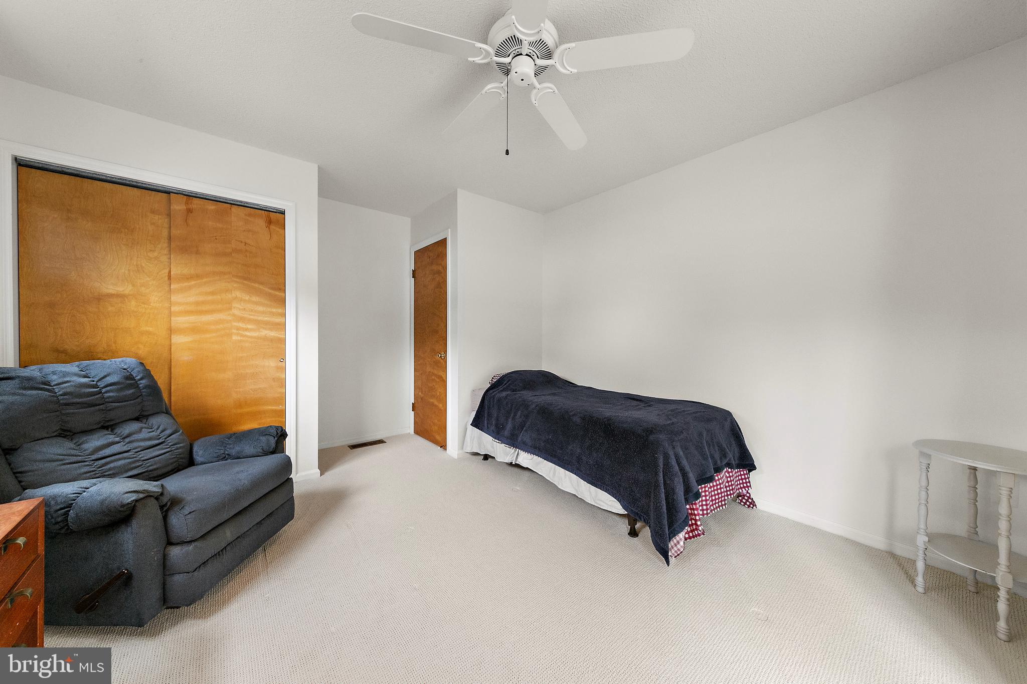 20 East 8th Street Barnegat Light, NJ 08006 - Photo 48 of 80 a bedroom with bed couch and window
