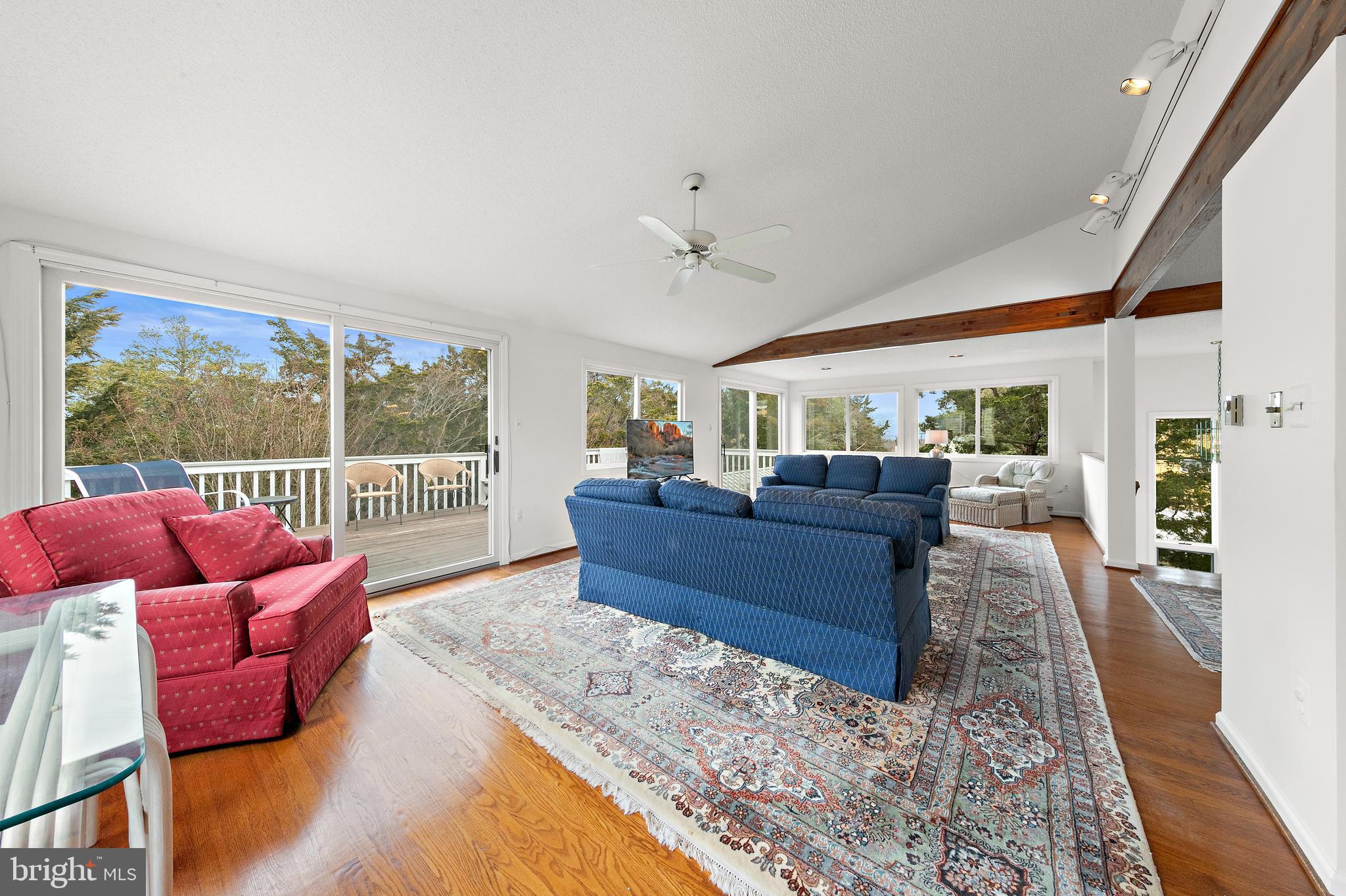 20 East 8th Street Barnegat Light, NJ 08006 - Photo 10 of 80 a living room with furniture and a large window