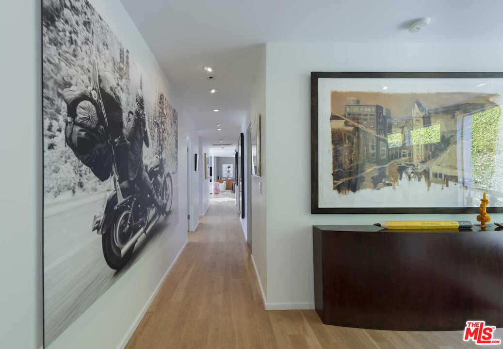 1566 Rising Glen Road Los Angeles, CA 90069 - Photo 14 of 32 a view of an entryway with a lot of stuff