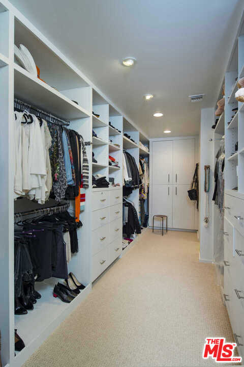 1566 Rising Glen Road Los Angeles, CA 90069 - Photo 24 of 32 a view of a room with gym equipment