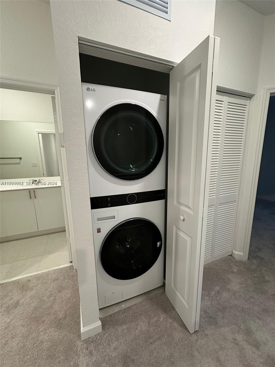 12868 Southwest 232nd Terrace Homestead, FL 33032 - Photo 24 of 48 a view of a hallway with washer and dryer