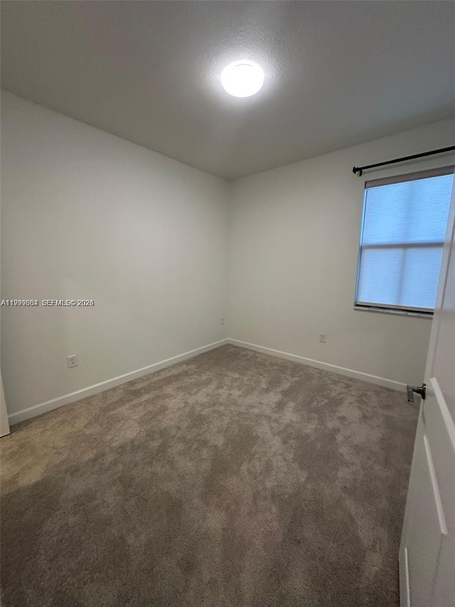 12868 Southwest 232nd Terrace Homestead, FL 33032 - Photo 29 of 48 a view of an empty room